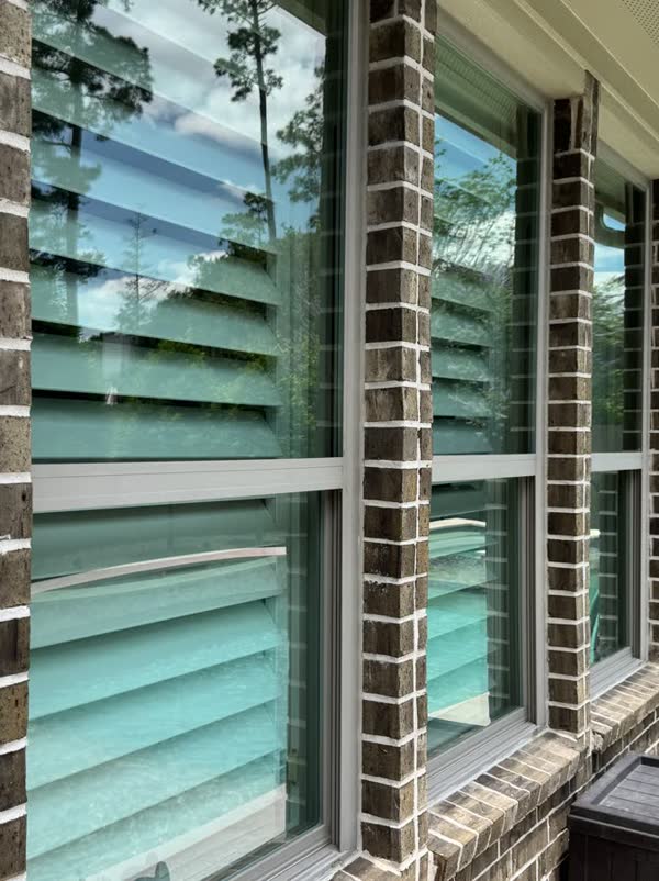 Plantation shutters, poolside in Houston, by Rinse & Shine